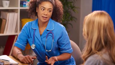 A doctor consulting a patient.