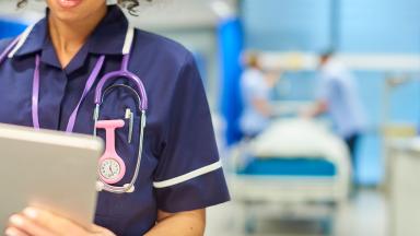 A nurse with a clipboard.