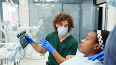 Surgeon talking to a patient