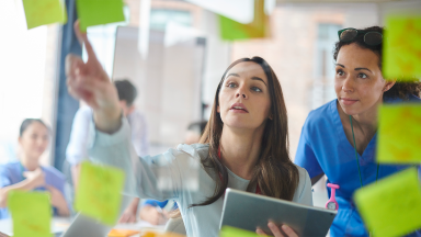 Two women brainstorming.png