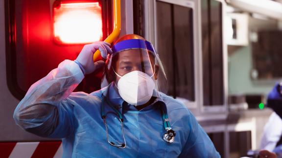 A doctor wearing full PPE.