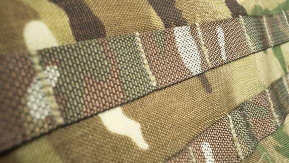 A close up of camouflaged military equipment. 