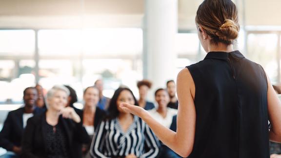A webinar leader, presenting.