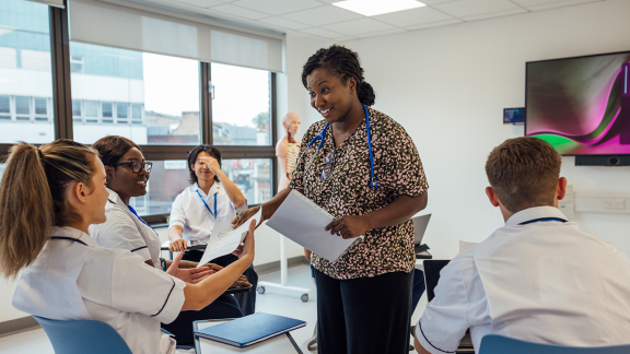 a group of seated nurses.png