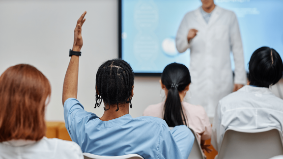 Student raising hand up