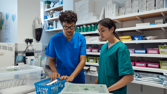 Two nurses in the medicine room