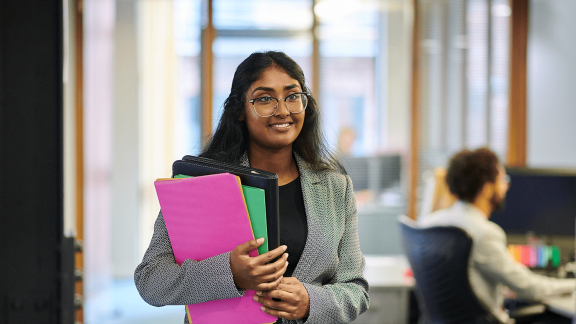 young woman holding file