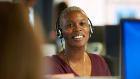 An office worker wearing a headset.