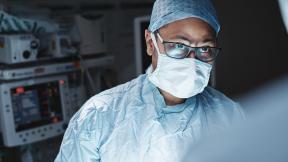 A surgeon mid-surgery.