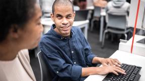 Office worker at keyboard