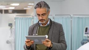 Doctor using iPad