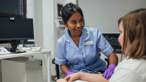 Nurse treating patient.png