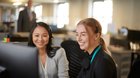 Two ladies on a work computer