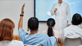 Student raising hand up