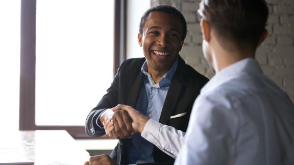 A handshake during an interview. 