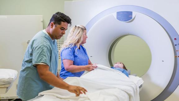A patient entering an MRI scanner.