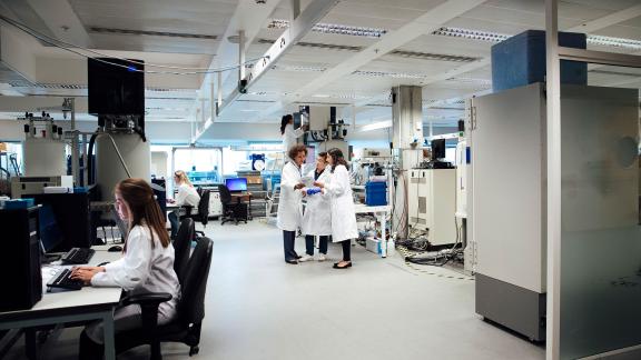 A group of scientists in a lab.