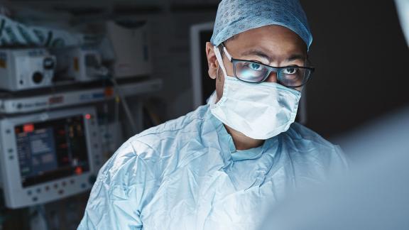 A surgeon mid-surgery.