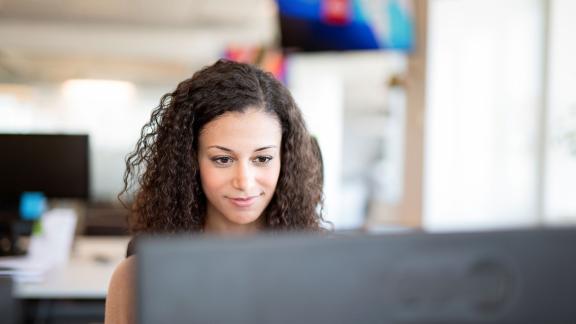 An office worker at their computer.