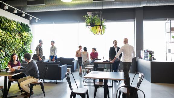 Image of people meeting in a communal area