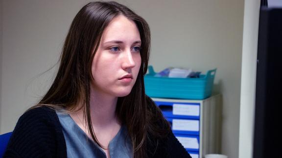 Admin worker at computer