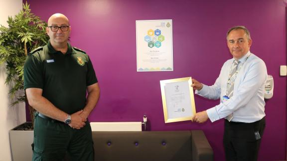 Rod Barnes, Chief Executive of Yorkshire Ambulance Service presents award to John Holden, former head of EPRR and special operations