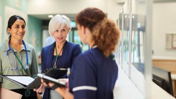 Staff talking on a ward