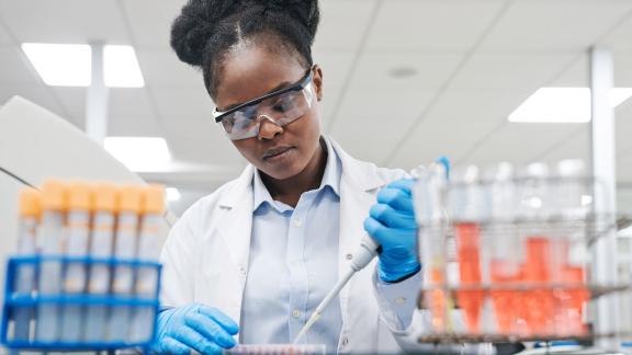 A healthcare scientist doing tests in a laboratory.