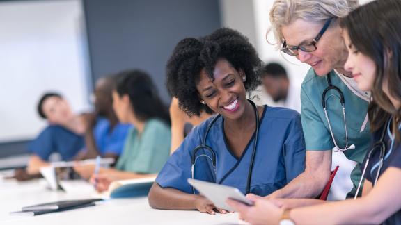 Student doctors with tutor