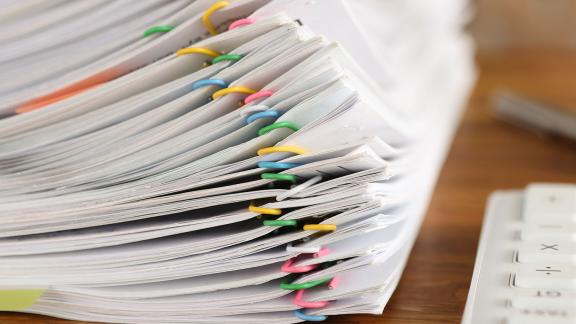 Stack-of-papers-and-calculator-hero-banner.jpg