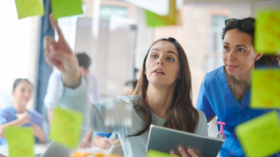 Two women brainstorming.png