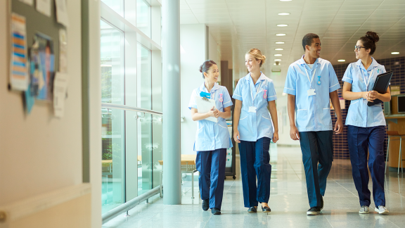 happy nurses discussing.png