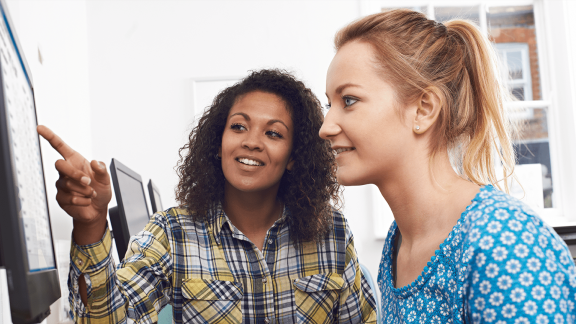 Two women on a computer