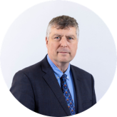 Headshot of Ciarán Devane