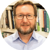 Headshot of Dr Richard Duggins