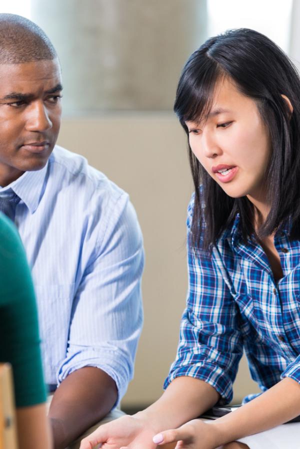 Image of workers talking