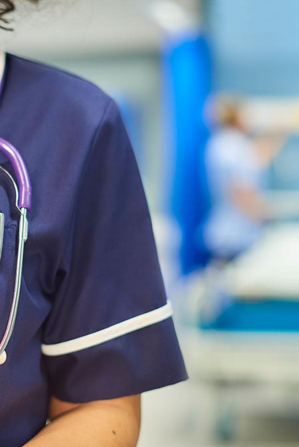 A nurse with a clipboard.