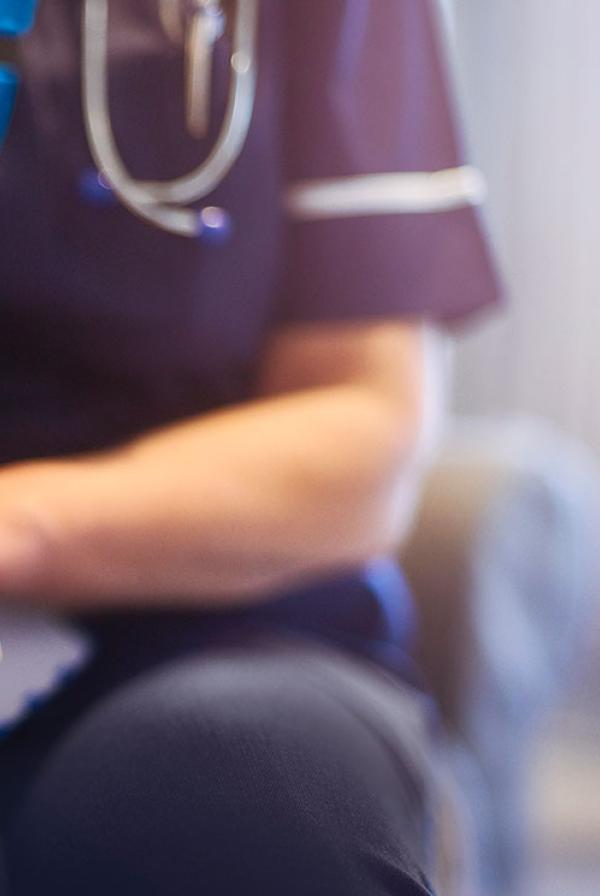 A nurse showing compassion to a patient. 