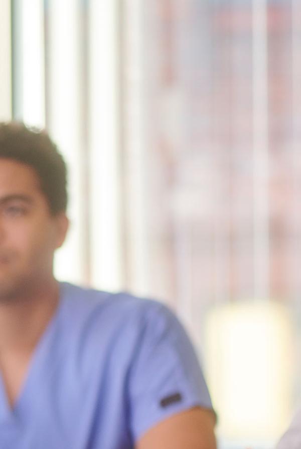 A diverse group of medical staff in a meeting.