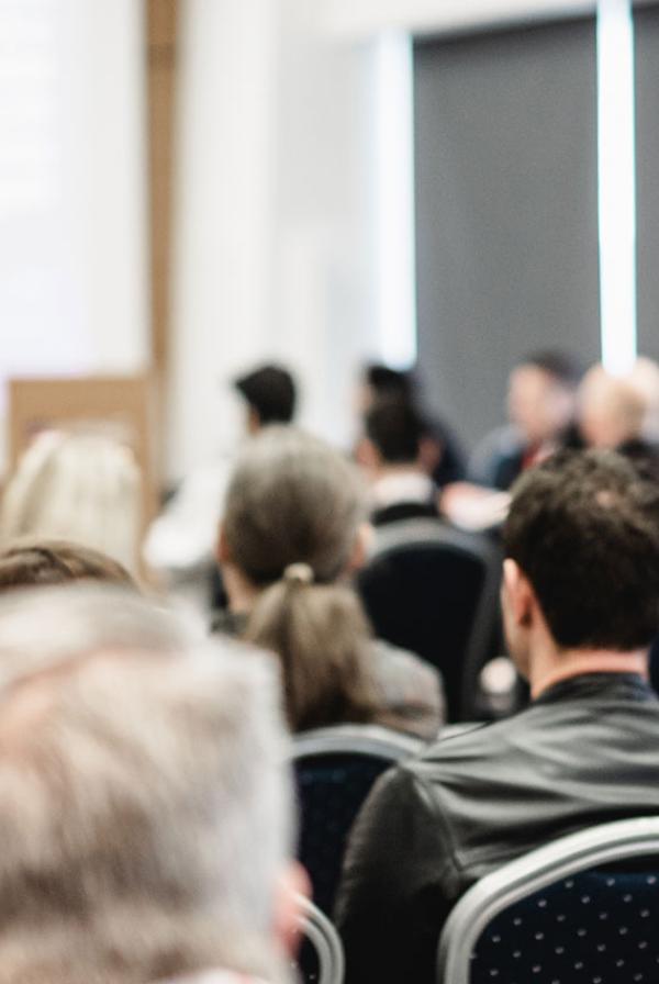 A speaker at a conference.
