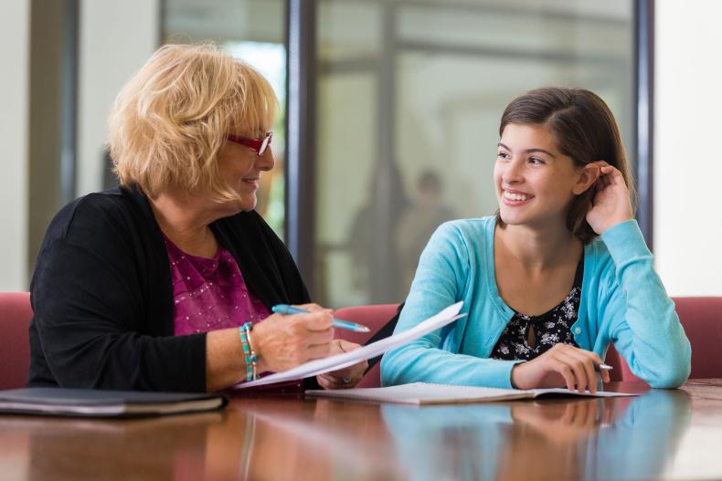 A young person being interviewed.